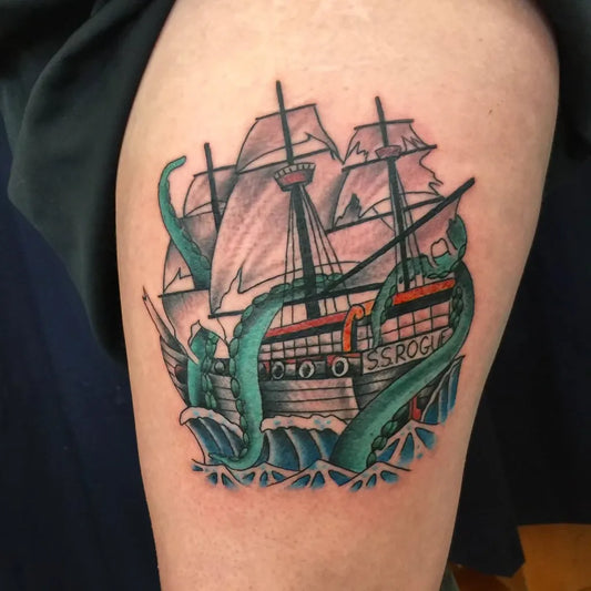 Medium Neo Traditional Ship and Tentacles Nautical Tattoo on Men Thigh by @freaksandgeekstattoo