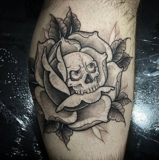 Medium Neo Traditional Skull Rose Leaves on Men Leg Tattoo by @eduart.tattoo.cxs
