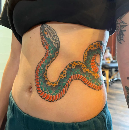 Medium Neo Traditional Snake Tattoo on Women Stomach by @jfztattoo