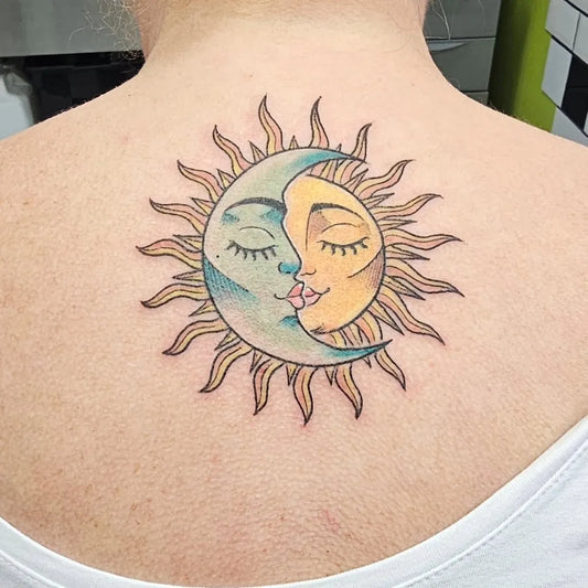 Medium Neo Traditional Sun and Moon Kissing on Women Back Tattoo by @corazontattoos.ltd