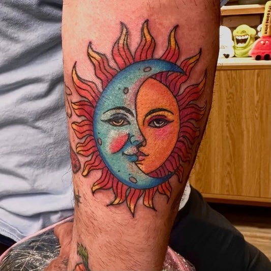 Medium Neo Traditional Sun and Moon on Men Arm Tattoo by @lupitattoo