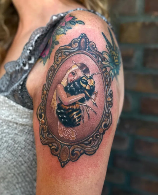 Medium Neo Traditional Woman with Bee Tattoo on Women Upper Arm by @inkaholicstattoo