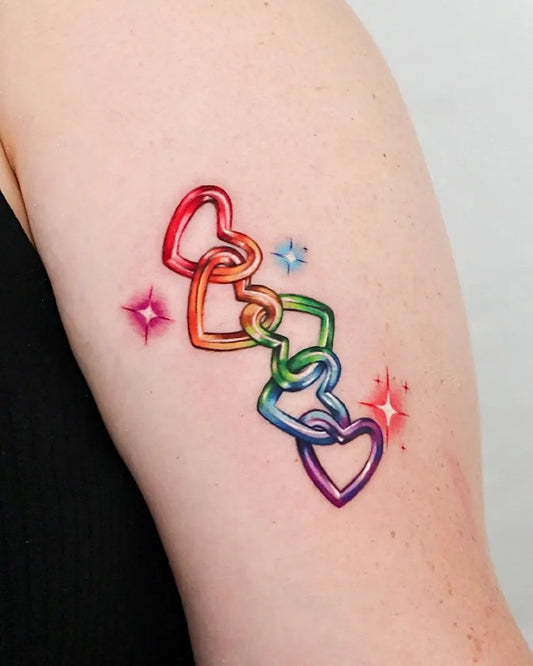 Medium Neon Rainbow Heart Chain on Women Arm Tattoo by @mei_tatt