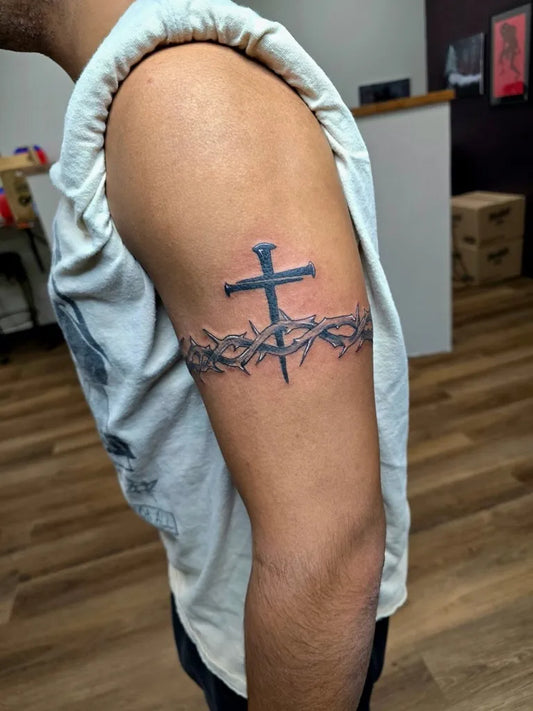 Medium Neotraditional Cross with Crown of Thorns on Men Arm Tattoo by @gator_ink33