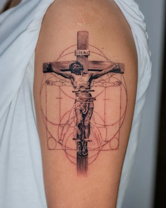 Medium Neotraditional Crucifixion Cross Vitruvian Man on Women Shoulder Tattoo by @nicolasattiehtattoos