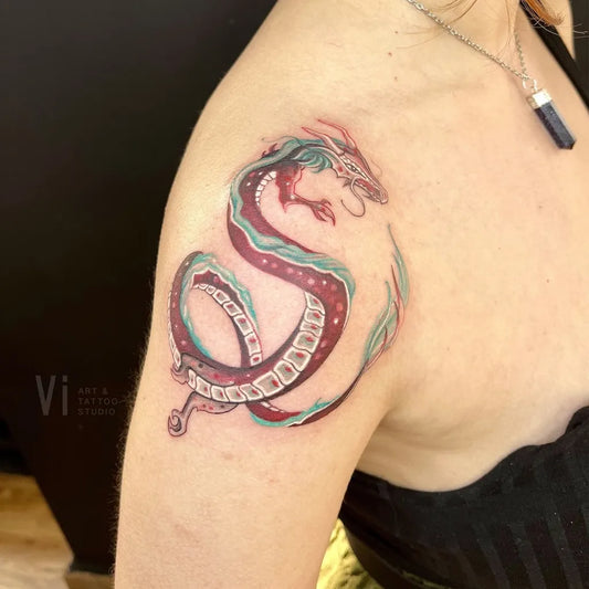 Medium Neotraditional Dragon Tattoo on Women Shoulder by @vitattoos.studio