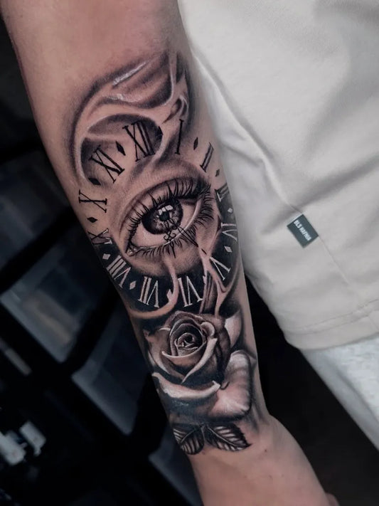 Medium Neotraditional Eye Clock Rose on Men Arm Tattoo by @theravi.ink