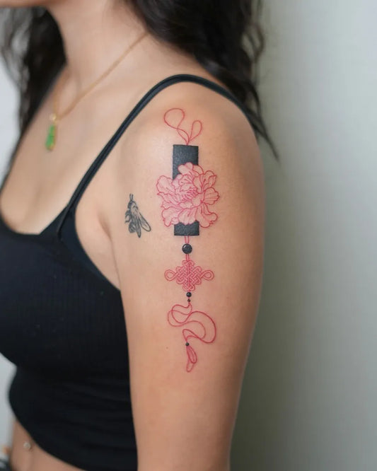 Medium Neotraditional Pink Flower Tassel on Women Shoulder Tattoo by @soul_imagez_tattoo