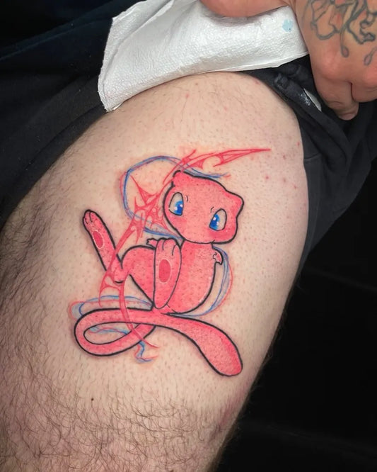 Medium Neotraditional Pink Pokemon Tattoo on Men Thigh by @marisita.tattoos