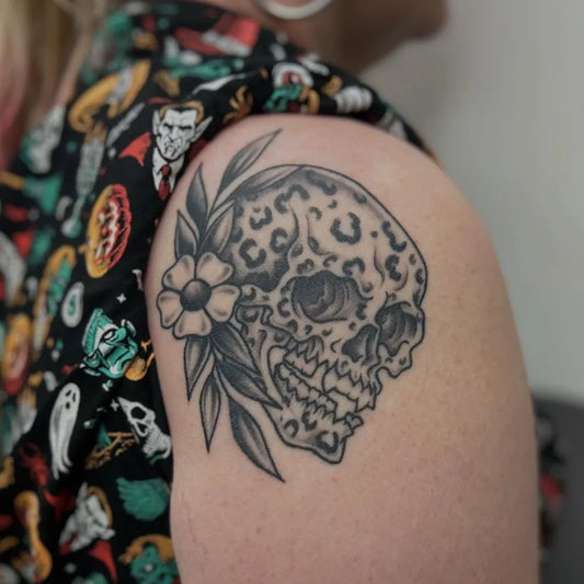 Medium Neotraditional Skull Leopard Print Flower on Women Shoulder Tattoo by @kerieedwardstattoo