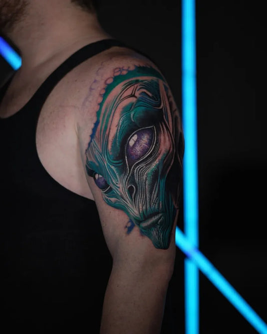 Medium New School Alien Head Tattoo on Men Shoulder by @oscarmejiatattoo