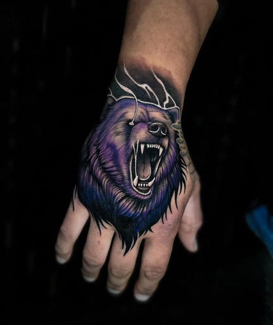 Medium New School Bear with lightning on Men hand Tattoo by @zebra_ink_