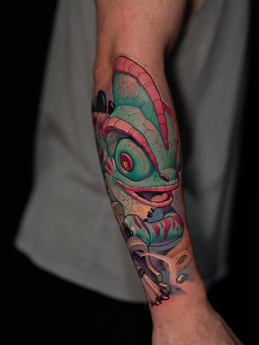 Medium New School Chameleon Tattoo on Men Arm by @family_art_tattoo