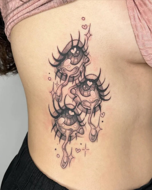 Medium New School Eyes and Tendrils Tattoo on Women Rib by @toothfairytats