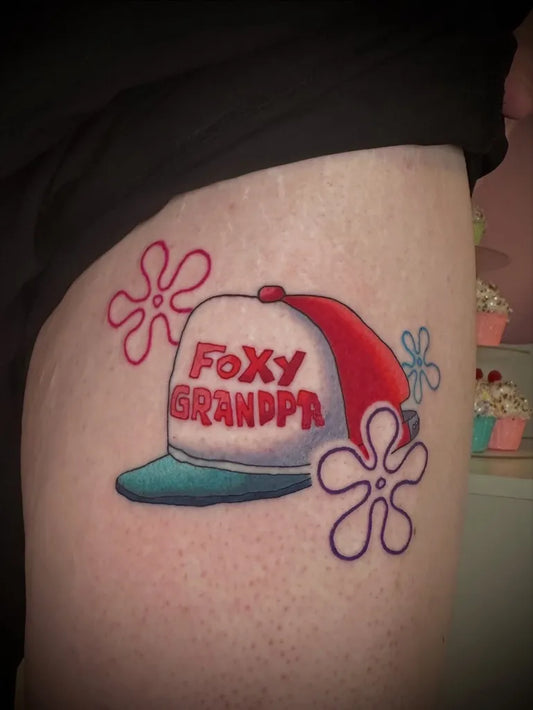 Medium New School Foxy Grandpappy Hat and Sea Flowers Cartoon Tattoo on Women Thigh by @hyesooktattoos