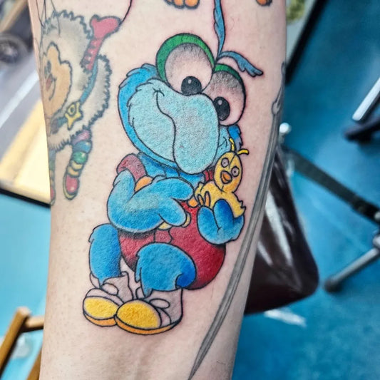 Medium New School Gonzo the Great with Chicken Cartoon Tattoo on Men Arm by @drmyk122