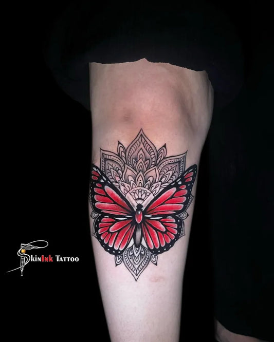 Medium New School Mandala Monarch Butterfly Tattoo on Women Knee by @skinink_tattoo_bangalore