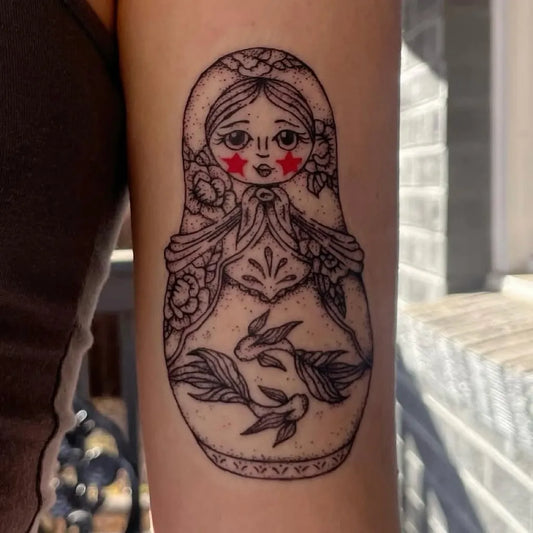 Medium New School Matryoshka with Pisces Tattoo on Women Arm by @tattoometamorphosis
