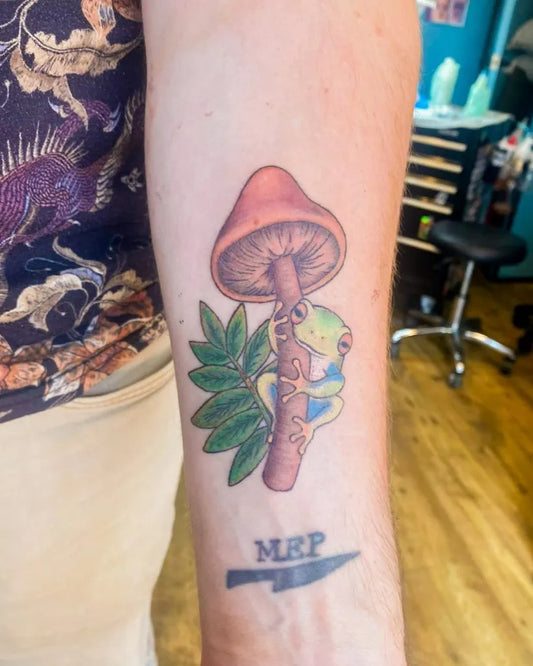 Medium New School Mushroom and Frog on Women Arm Tattoo by @forever.ink.tattoo.studio