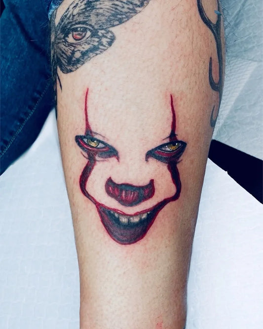 Medium New School Pennywise Horror Tattoo on Women Arm by @michael_bonelli__