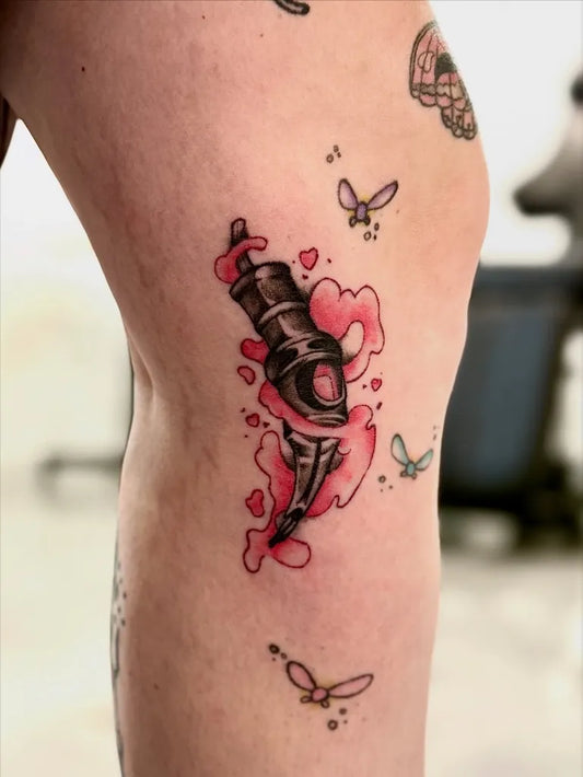 Medium New School Pink Rocket with Butterflies Tattoo on Women Thigh by @josie.tats