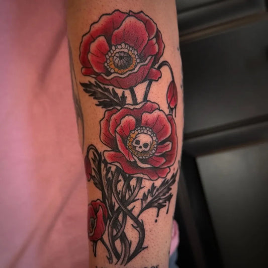 Medium New School Poppy Skull Tattoo on Women Arm by @mindy_fach_tattoo
