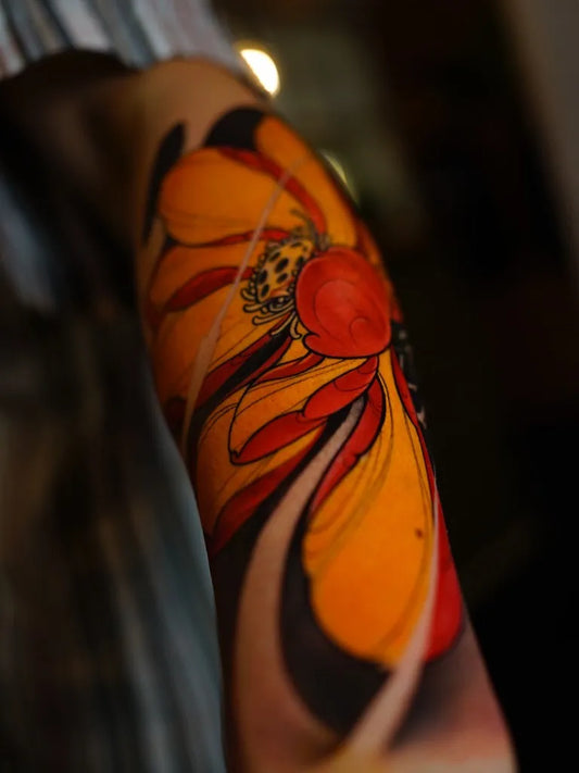 Medium New School Sunflower and Ladybug Tattoo on Women Arm by @cappellini_ink