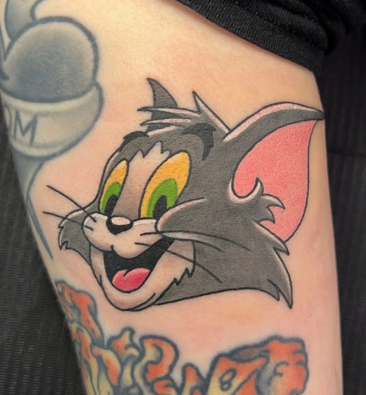 Medium New School Tom and Jerry Cartoon Tattoo on Women Arm by @jamiedonnellytattoos