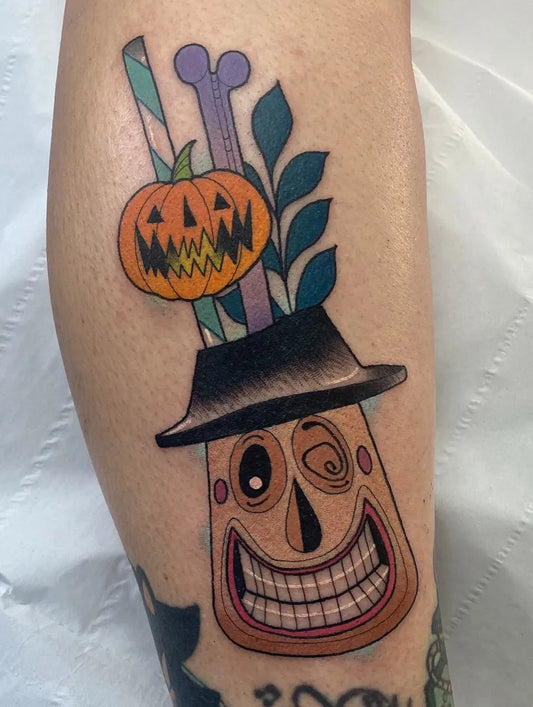 Medium Nightmare Before Christmas Oogie Boogie Tiki Mug Halloween Tattoo on Women Leg by @laurenapriltattoo