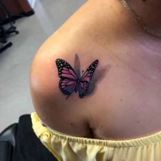 Medium OpticalIllusion Butterfly on Women Shoulder Tattoo by @tattoo_lust
