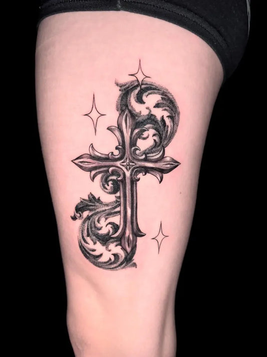 Medium Ornamental Cross Flourishes Stars on Women Thigh Tattoo by @stu_tattoosnm