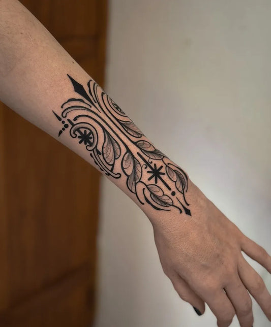 Medium Ornamental Floral Ornament Tattoo on Women Wrist by @cahhks