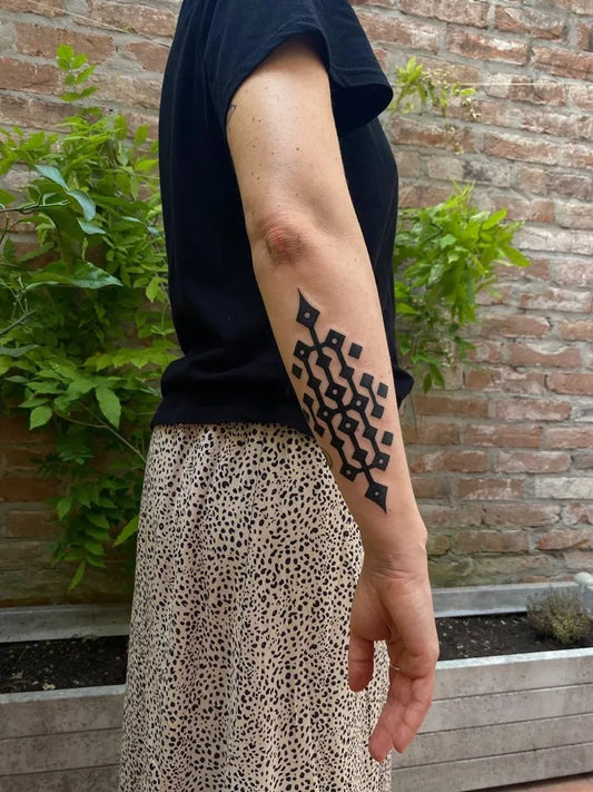 Medium Ornamental Geometric Pattern Tattoo on Women Elbow by @theinkharbor
