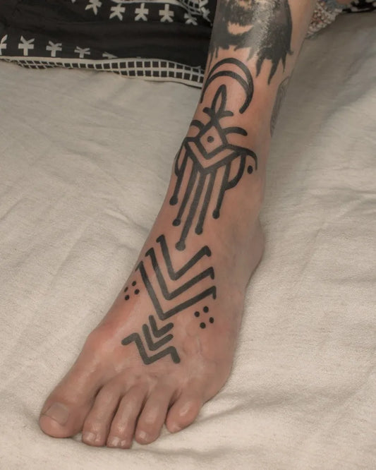 Medium Ornamental Geometric Tribal Pattern Tattoo on Women Foot by @indigotenerife