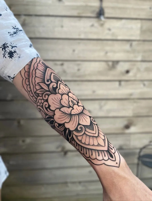 Medium Ornamental Mandala Flower Tattoo on Women Arm by @mamaizel
