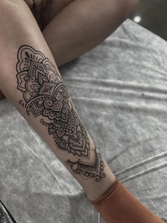 Medium Ornamental MandalaTattoo on Women Leg by @vril.tattoo.studio