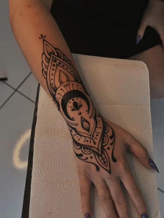 Medium Ornamental Moon Mandala Tattoo on Women Arm by @yastattua