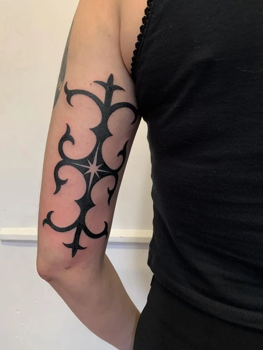 Medium Ornamental Symmetrical Floral Motif Tattoo on Women Arm by @martin__marine