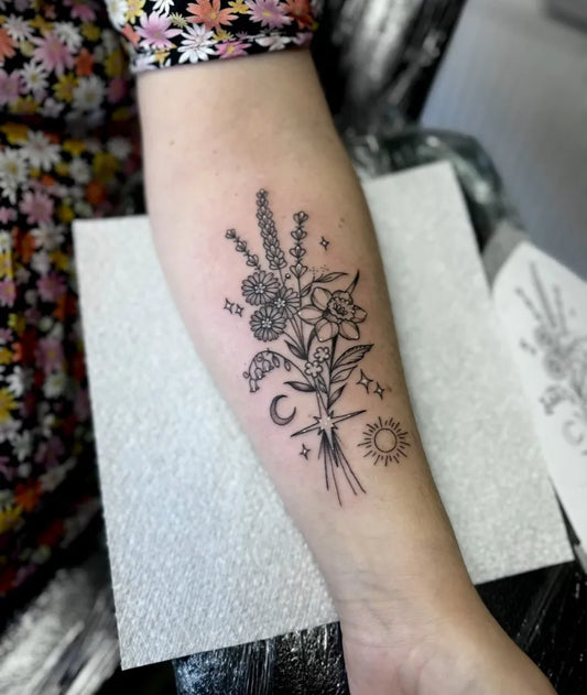 Medium Outline Floral Bouquet with Sun and Moon Tattoo on Women Forearm by @foxx.teeth_