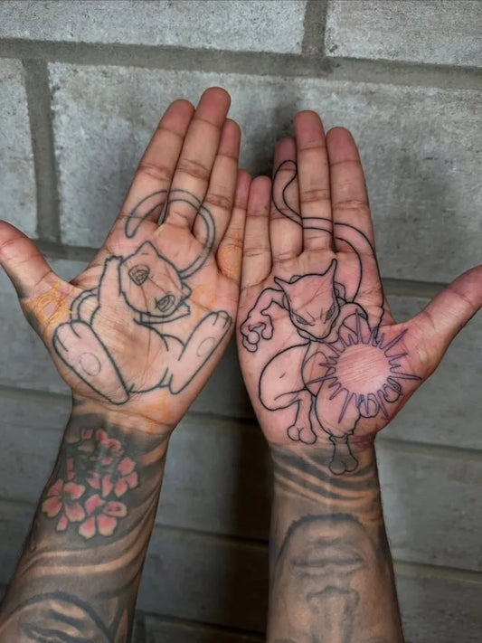 Medium Outline Mew Tattoo on Men Hands by @pokemon.tatts