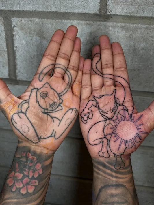 Medium Outline Mewtwo Pokemon Tattoo on Men Hands by @lukeaashley