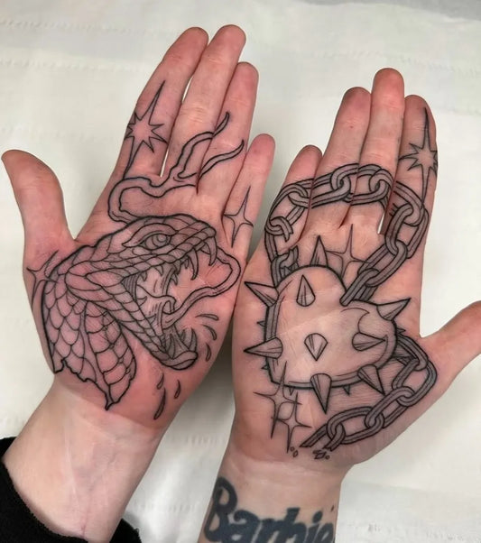 Medium Outline Snake Spiked Heart Chains Tattoo on Women Hands by @blackwhiteinkart