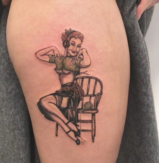 Medium Pinup Pin Up Girl Knitting Chair Tattoo on Women Thigh by @dexteradeitattoo