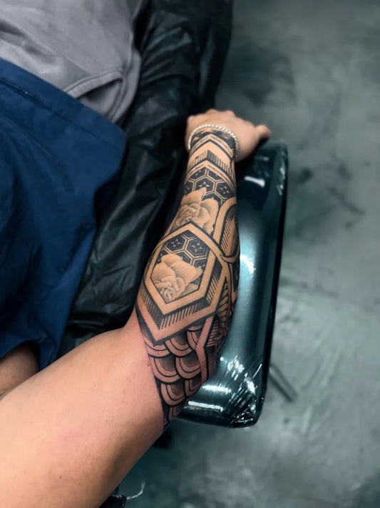 Medium Polynesian Tribal Patterns and Hexagon Design Tattoo on Men Arm by @thomaskuloloia_juan