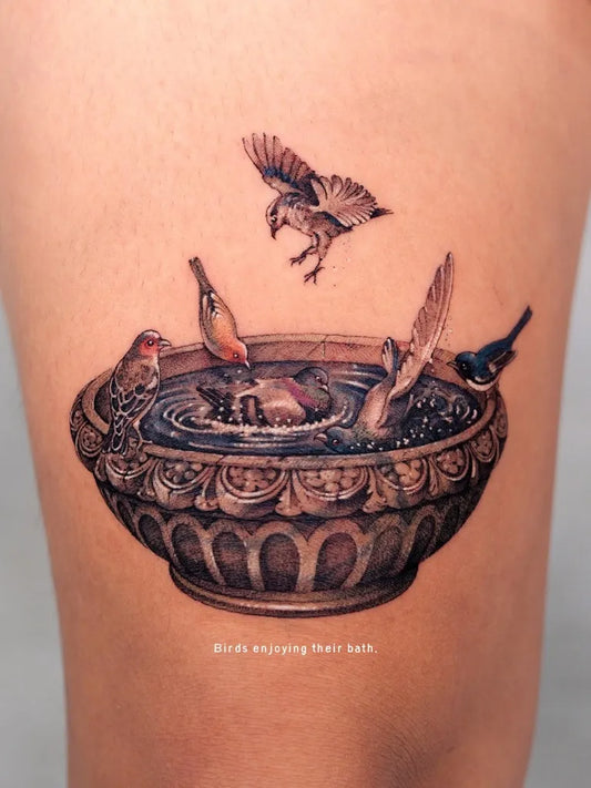 Medium Realism Birds Bath Tattoo on Women Thigh by @soltattoo