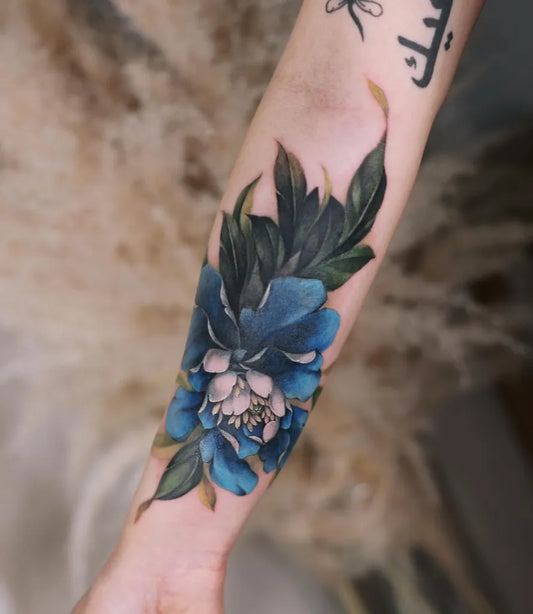 Medium Realism Blue Peony and Arabic Script on Women Arm Tattoo by @doraahuuu.art