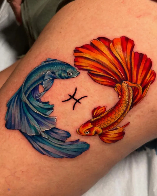Medium Realism Blue and Orange Betta Fish Pisces Tattoo on Women Thigh by @tattoojarr