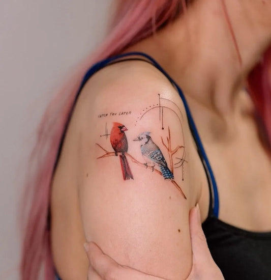 Medium Realism Cardinal and Blue Jay Tattoo on Women Shoulder by @wolfdencustomtattoo