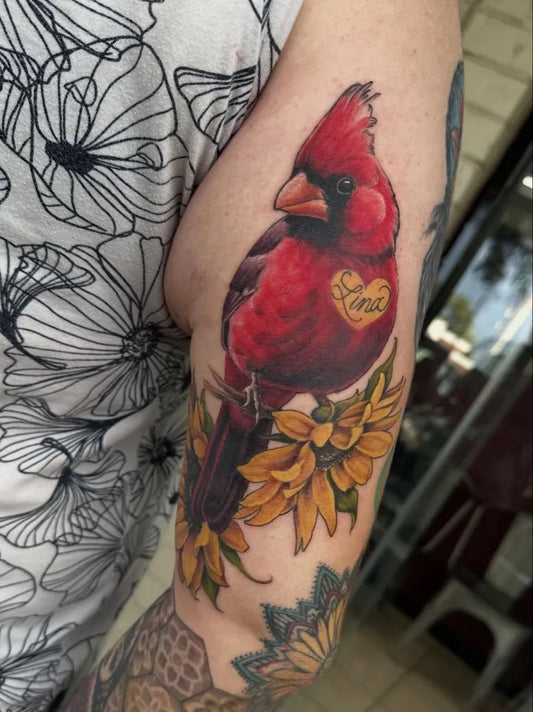 Medium Realism Cardinal and Sunflowers Tattoo on Women Arm by @villustrated