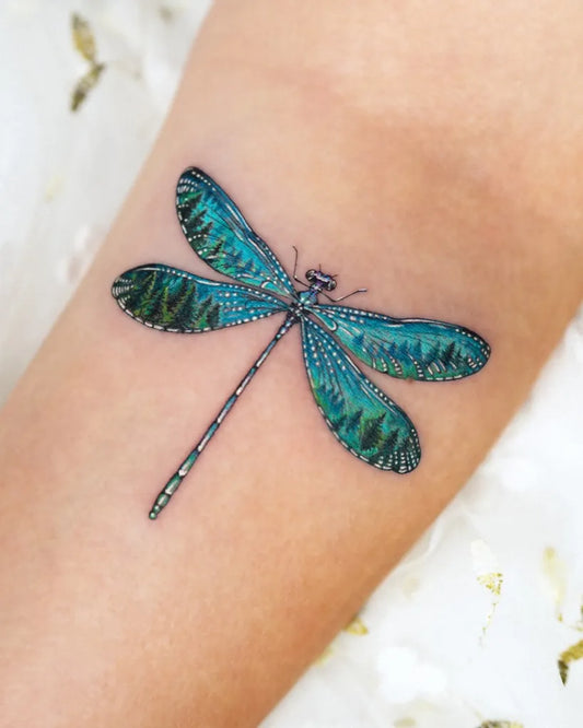 Medium Realism Dragonfly on Women Arm Tattoo by @enni.tattoo